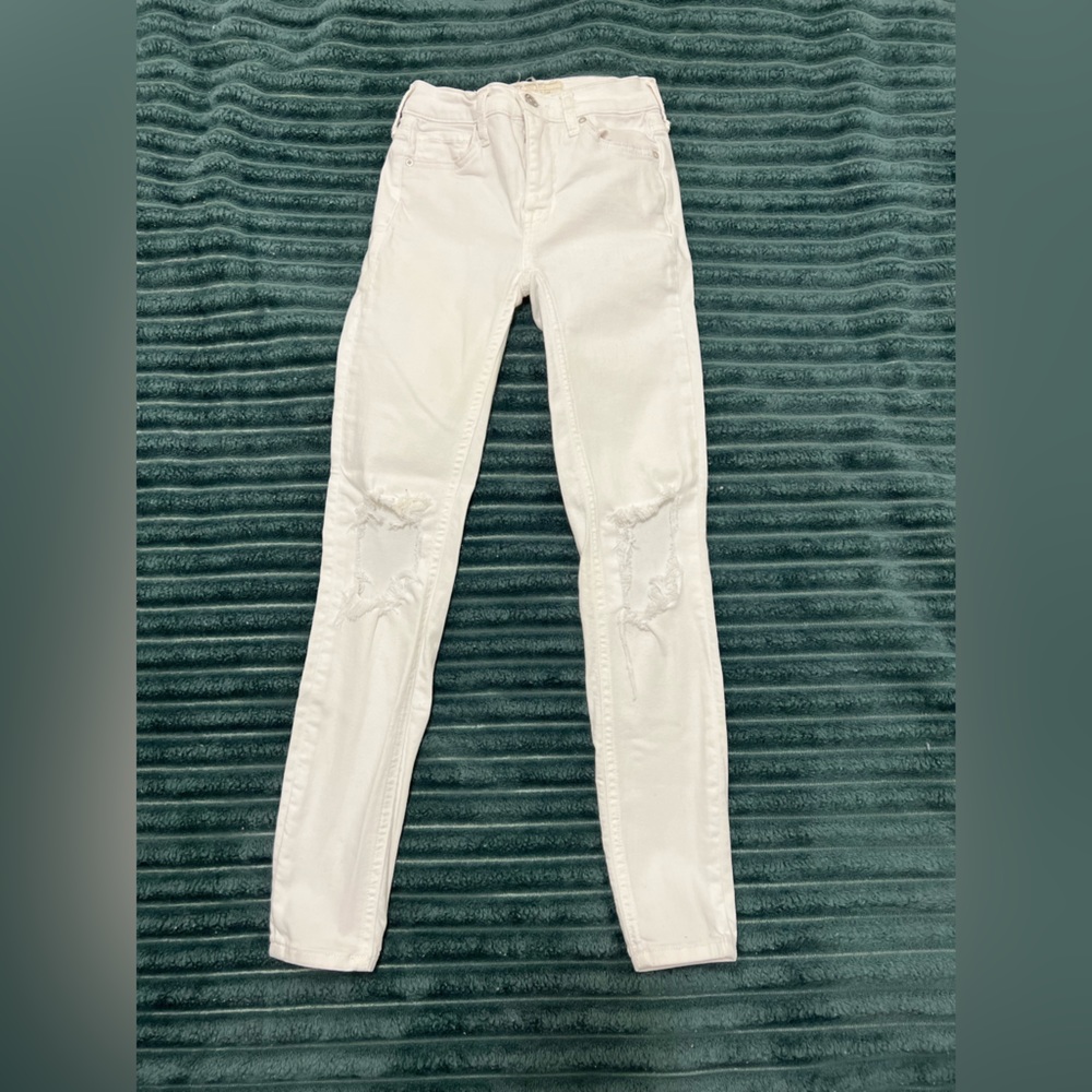 Free People busted knee skinny jeans